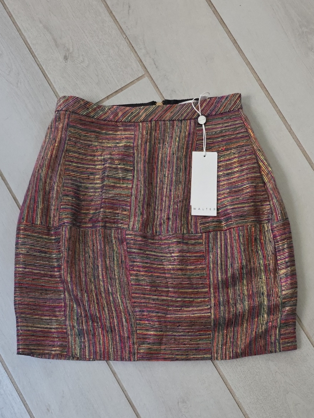 Walter Baker mini skirt features a gold lurex woven pattern with multicolored ..